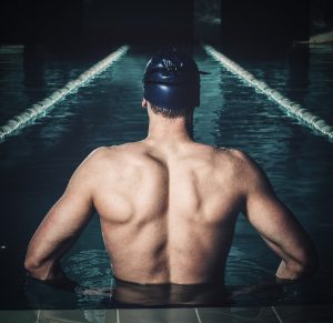 male swimmer in his lane (respecting workplace boundaries)