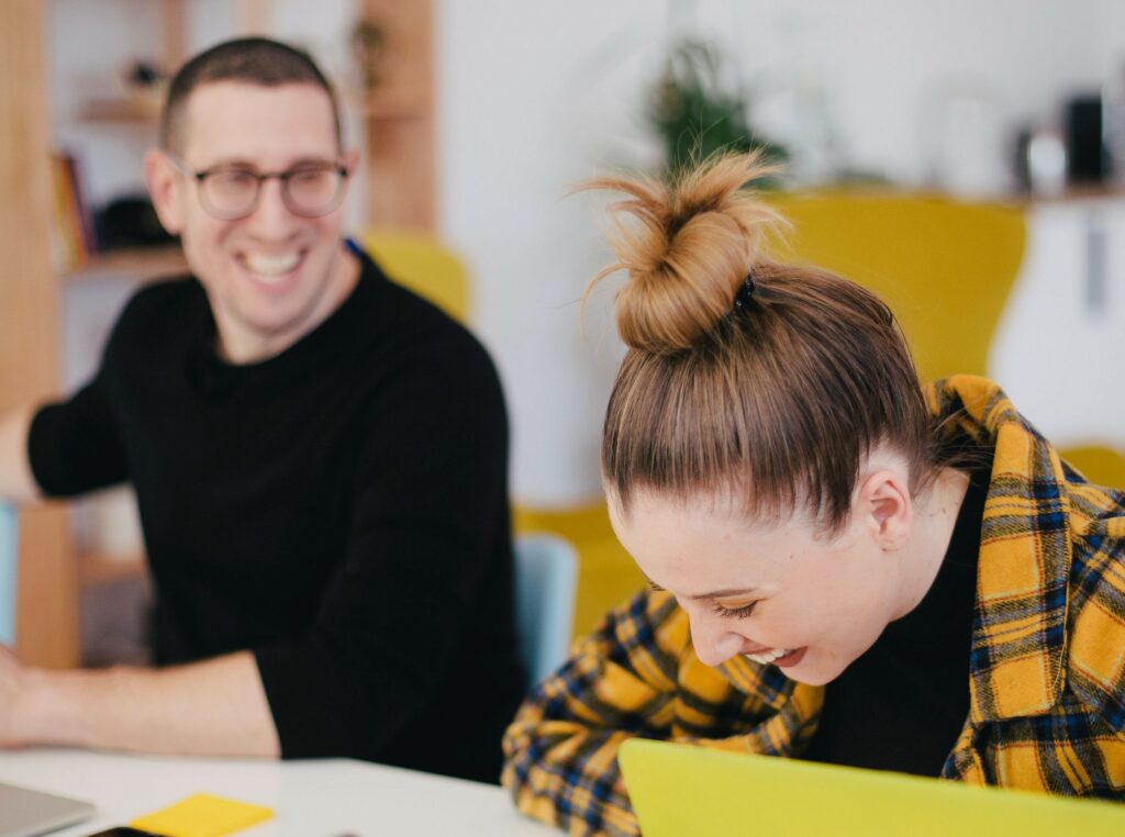 two young colleagues at work