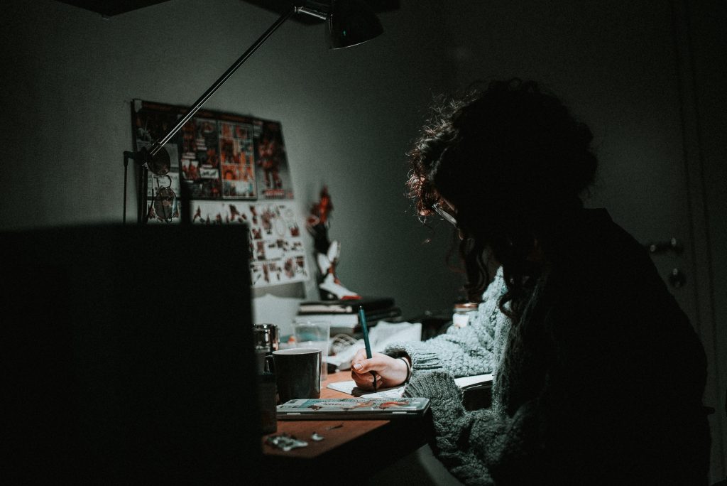woman working late but quiet firing