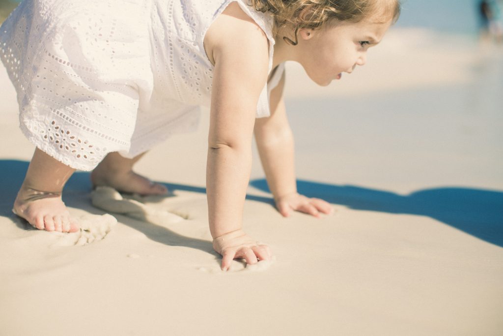 little girl learning to walk