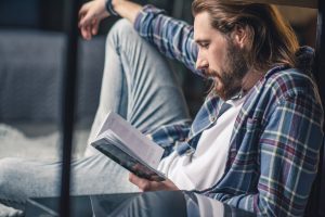 guy reading career book