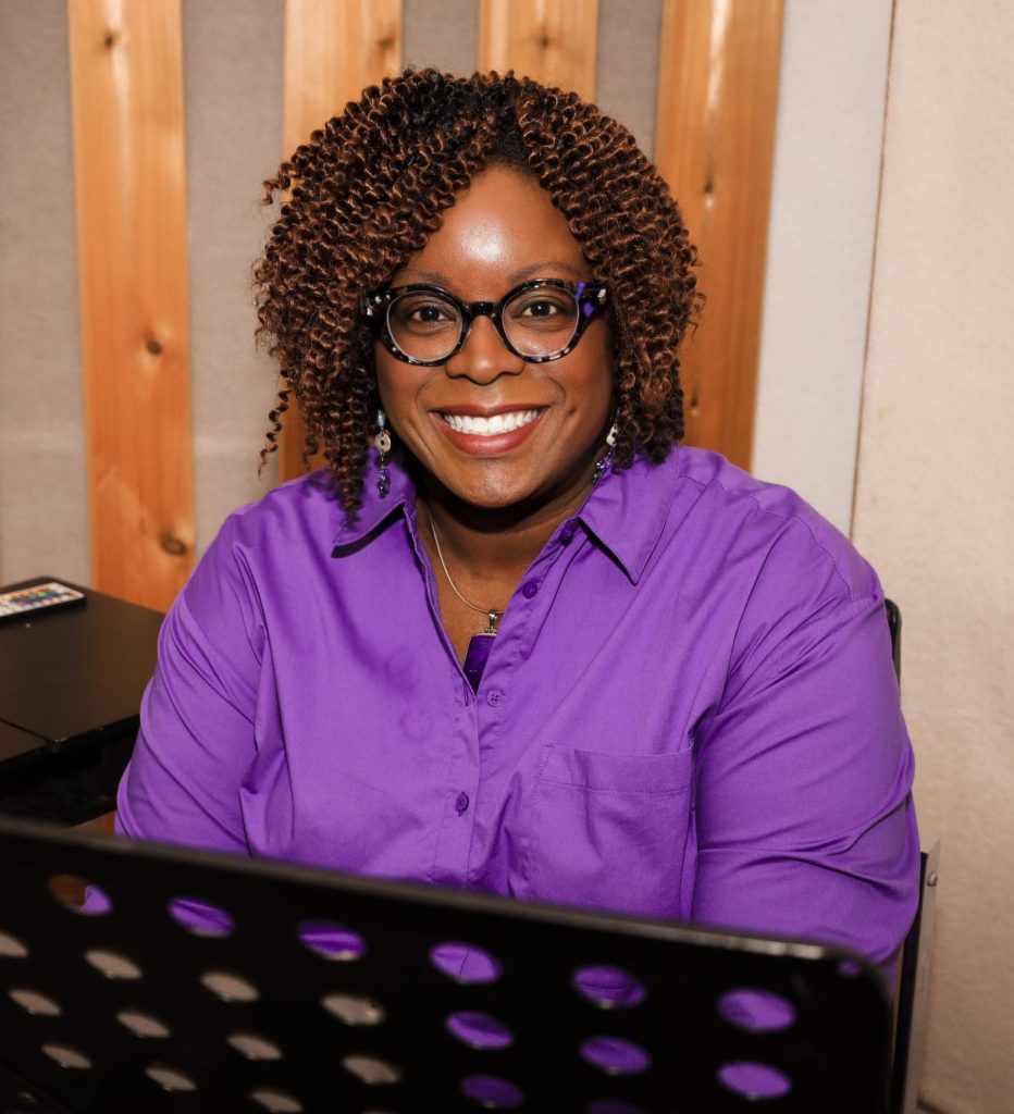 Photo of Dr. Helen Ofosu in recording booth
